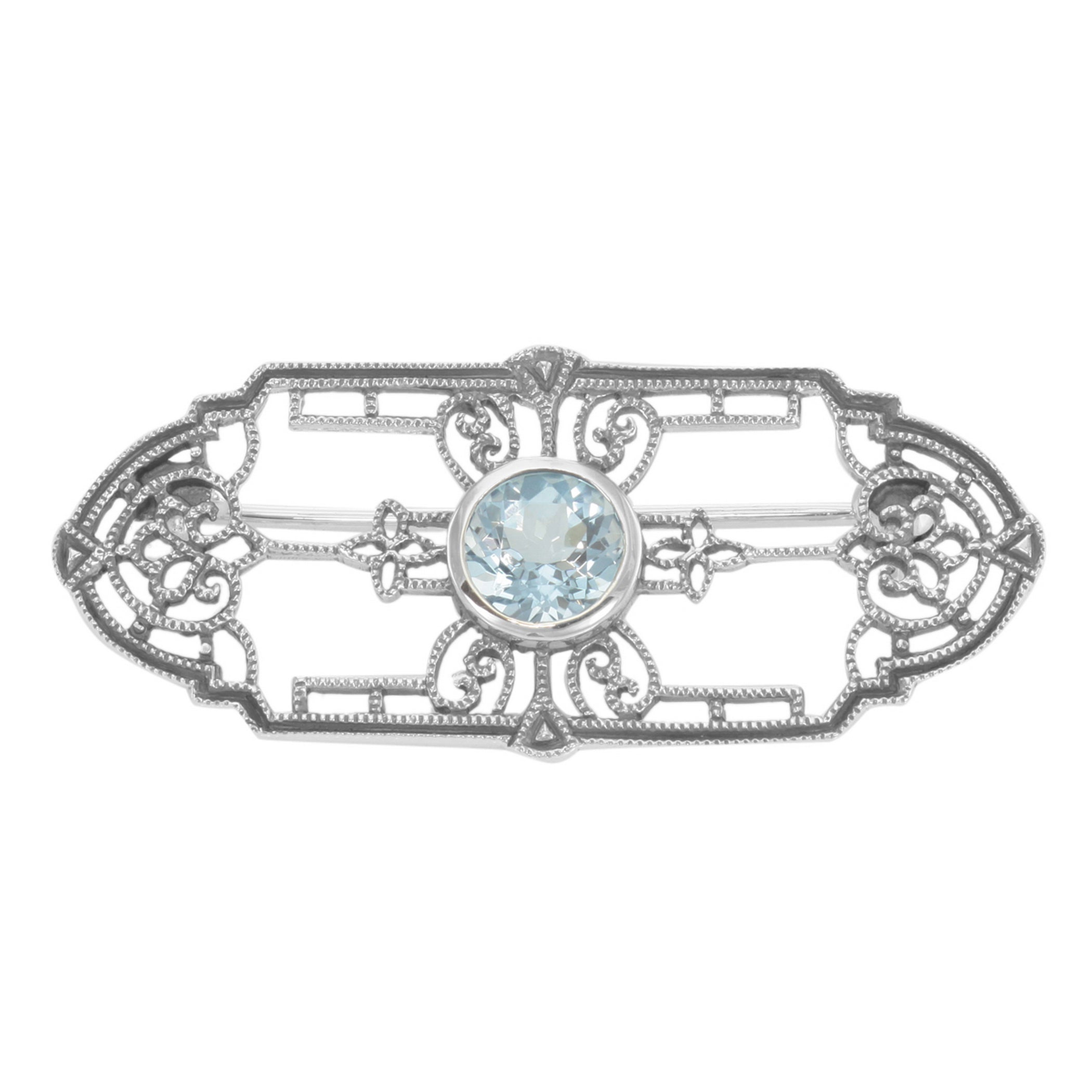 Art Deco style, Blue Topaz, sterling silver brooches / pins, front view
