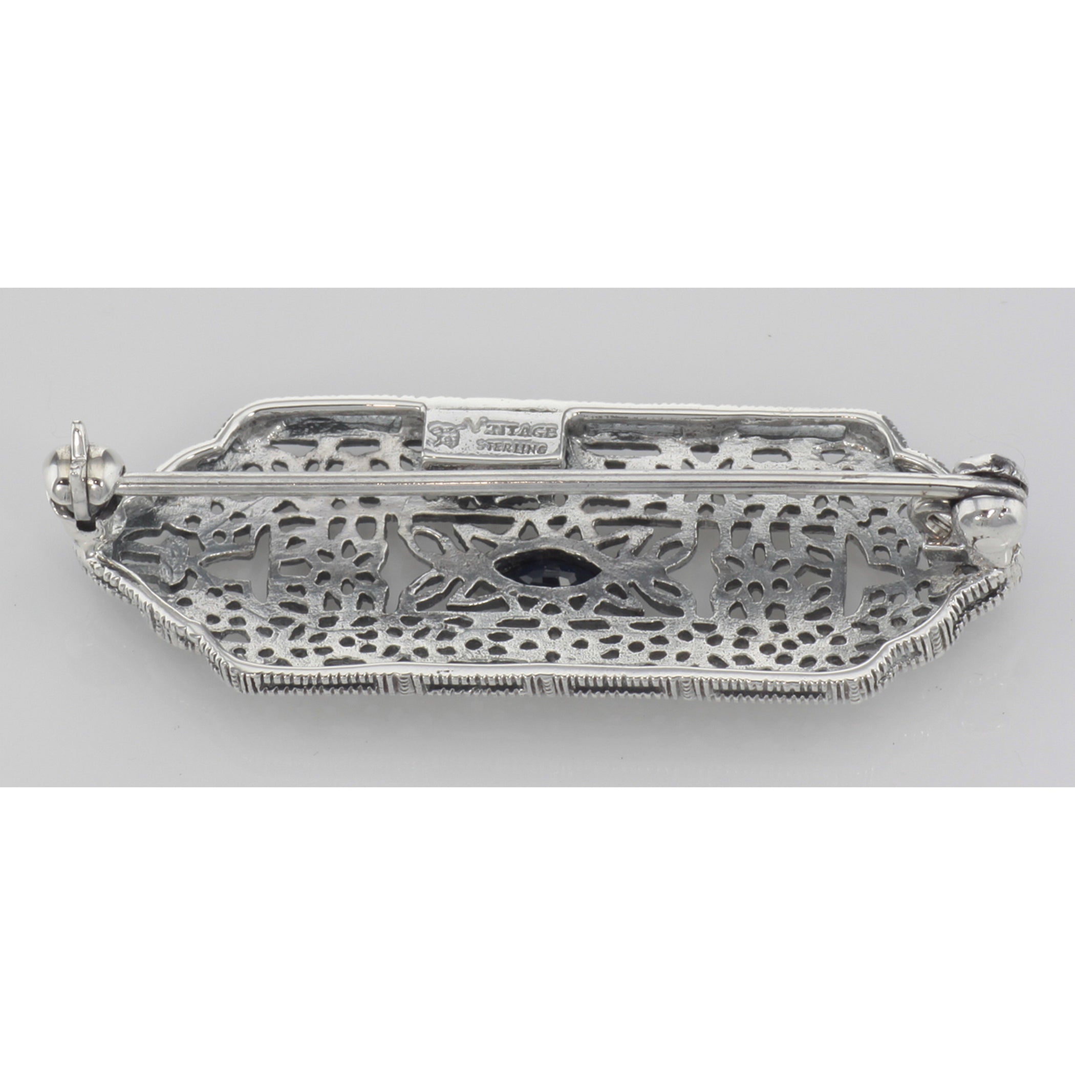 Back view of Art Deco Style Filigree Blue Sapphire Pin / Brooch showing 925 sterling silver hallmark and pin back