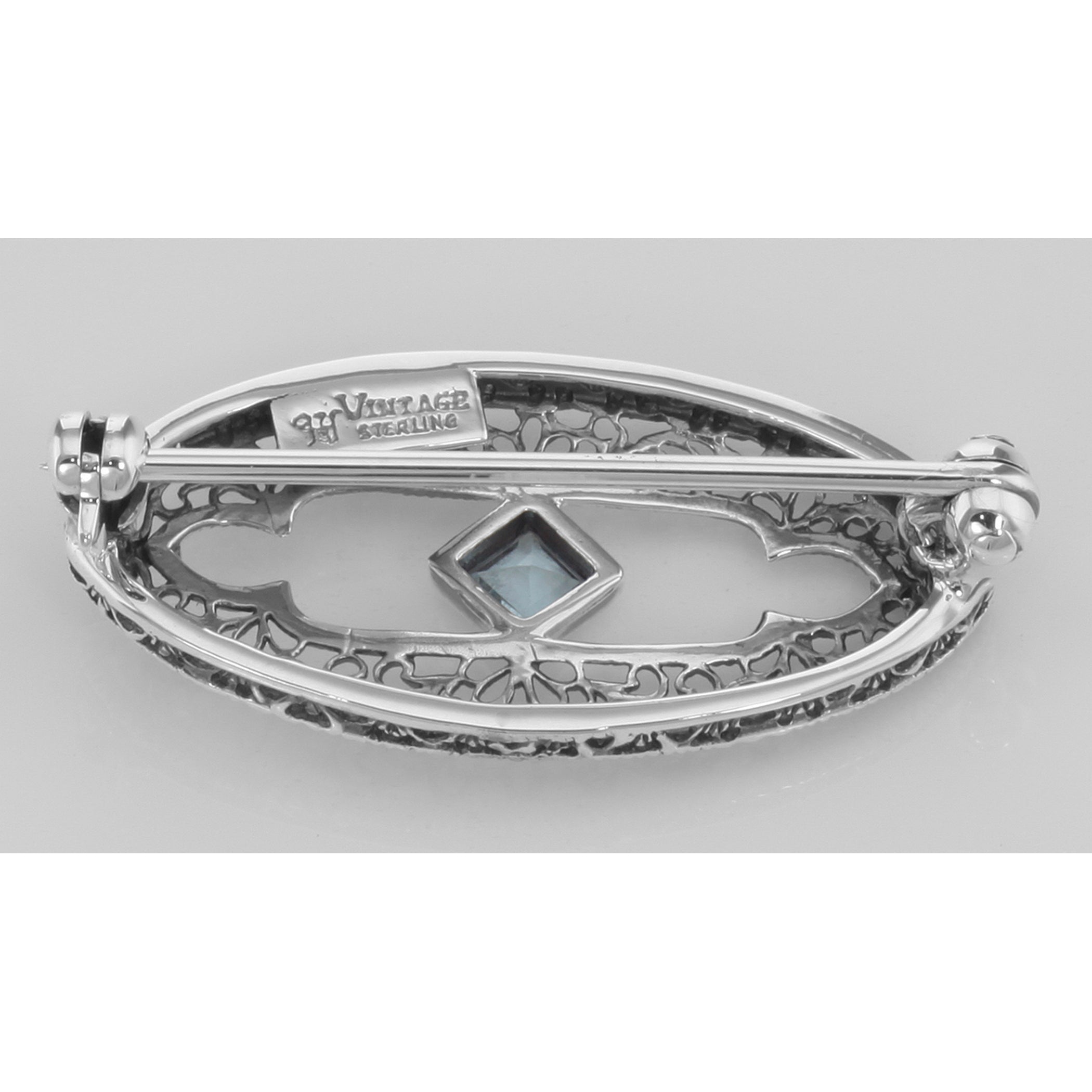 Back view of Antique Style Filigree Pin / Brooch with Genuine Blue Topaz Sterling Silver showing 925 sterling silver hallmark