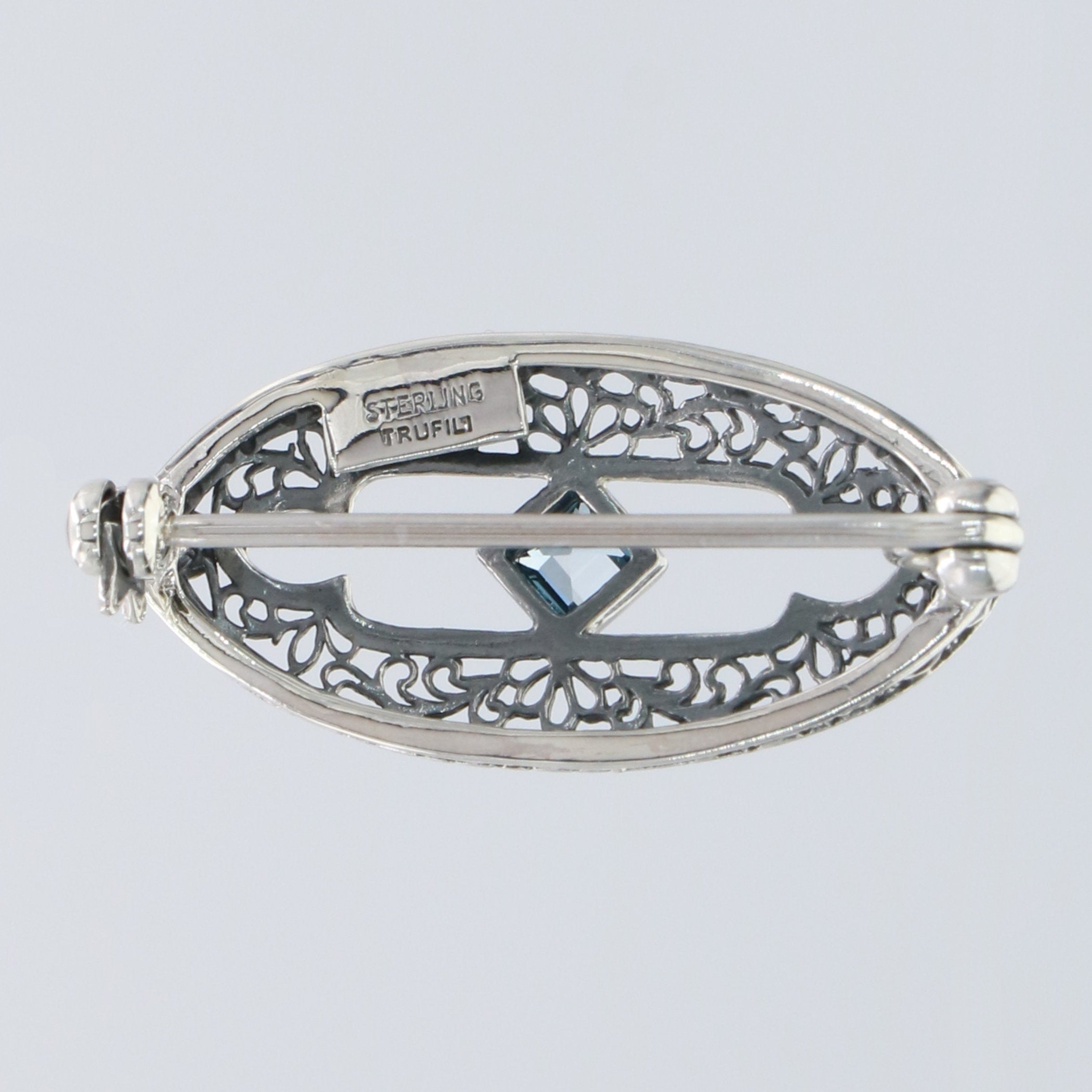 Back view of Antique Style Filigree Pin / Brooch with London Blue Topaz Sterling Silver showing 925 sterling silver hallmark 