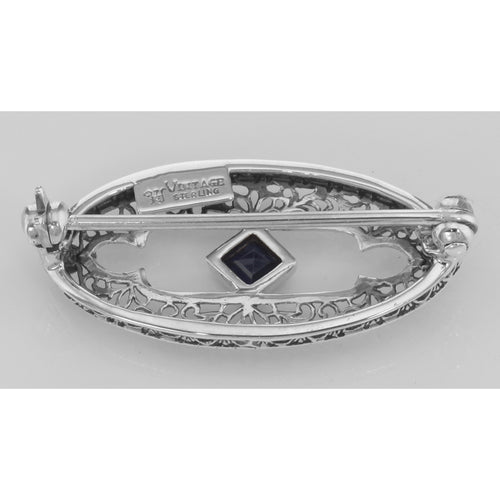 Back view of Antique Style Filigree Blue Sapphire Pin / Brooch showing 925 sterling silver hallmark and pin back