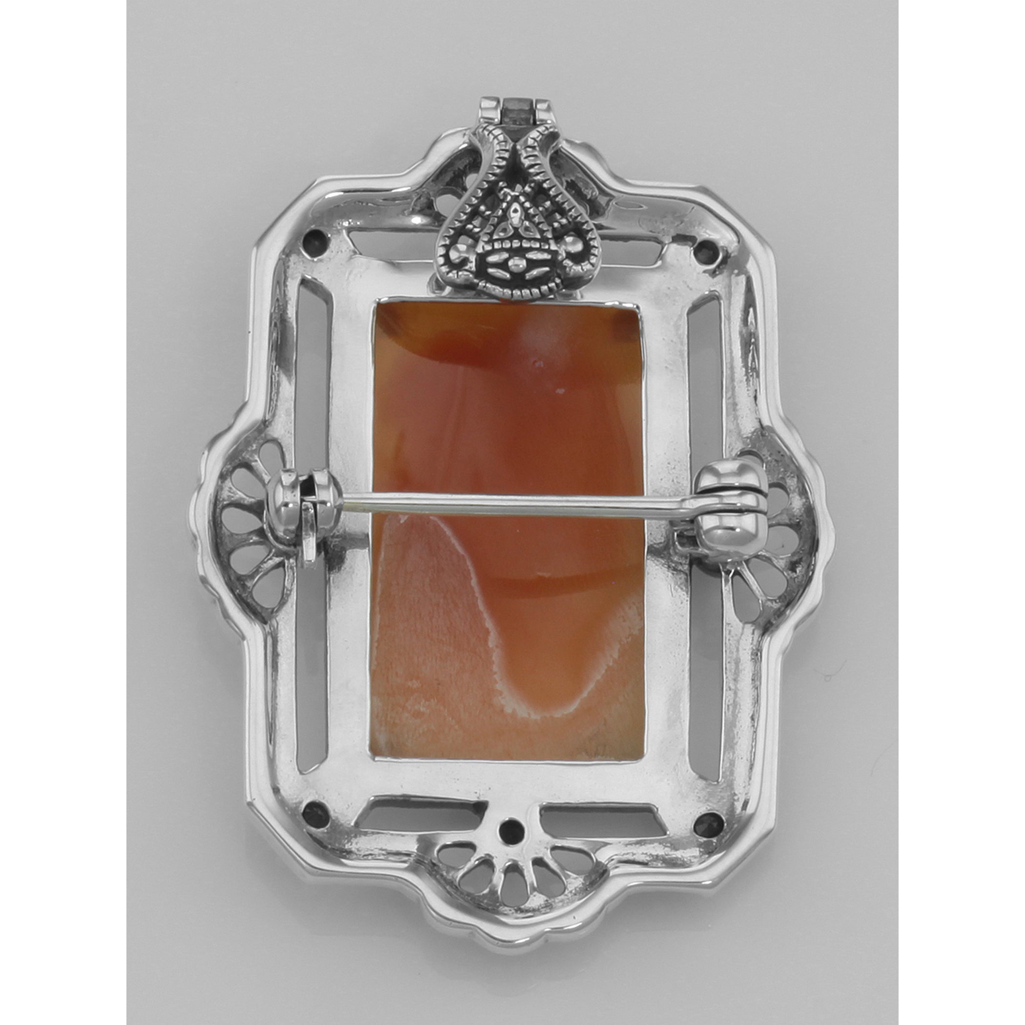 Back view of Lovely Italian Shell Cameo Pin or Pendant with Blue Sapphires showing 925 sterling silver hallmark and spring ri