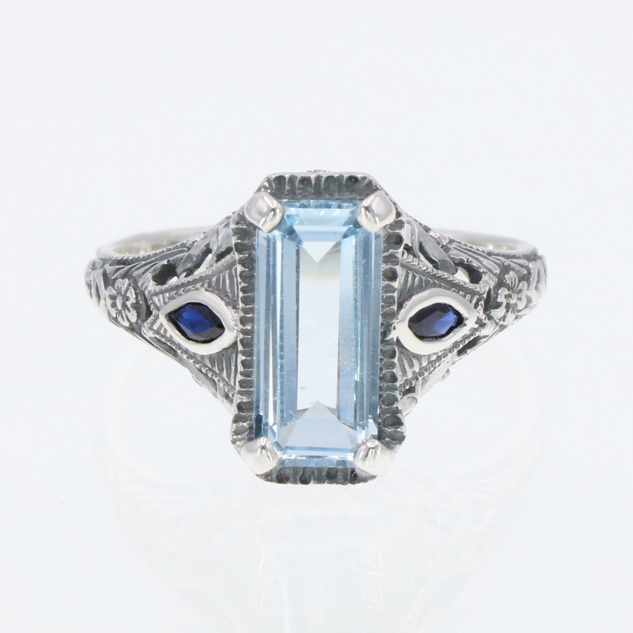 Back view of Art Deco Style Blue Topaz Filigree Ring Sapphire Accents Sterling Silver showing 925 sterling silver hallmark
