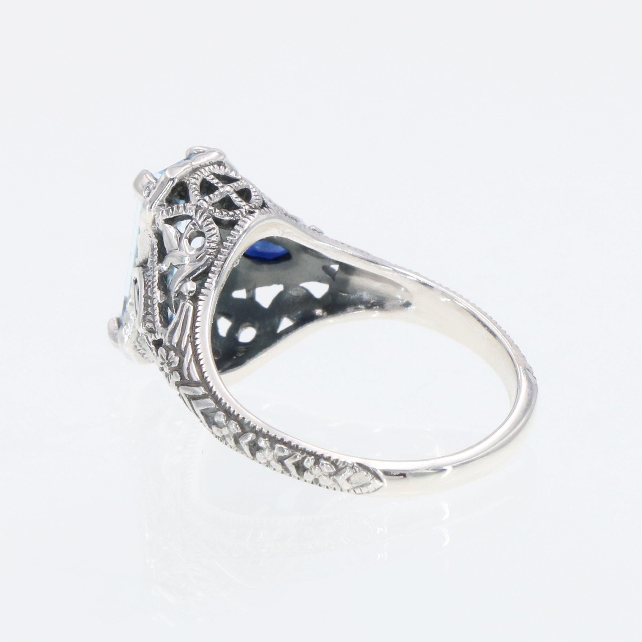Detail view of Art Deco Style Blue Topaz Filigree Ring Sapphire Accents Sterling Silver highlighting Blue Topaz, Sapphire