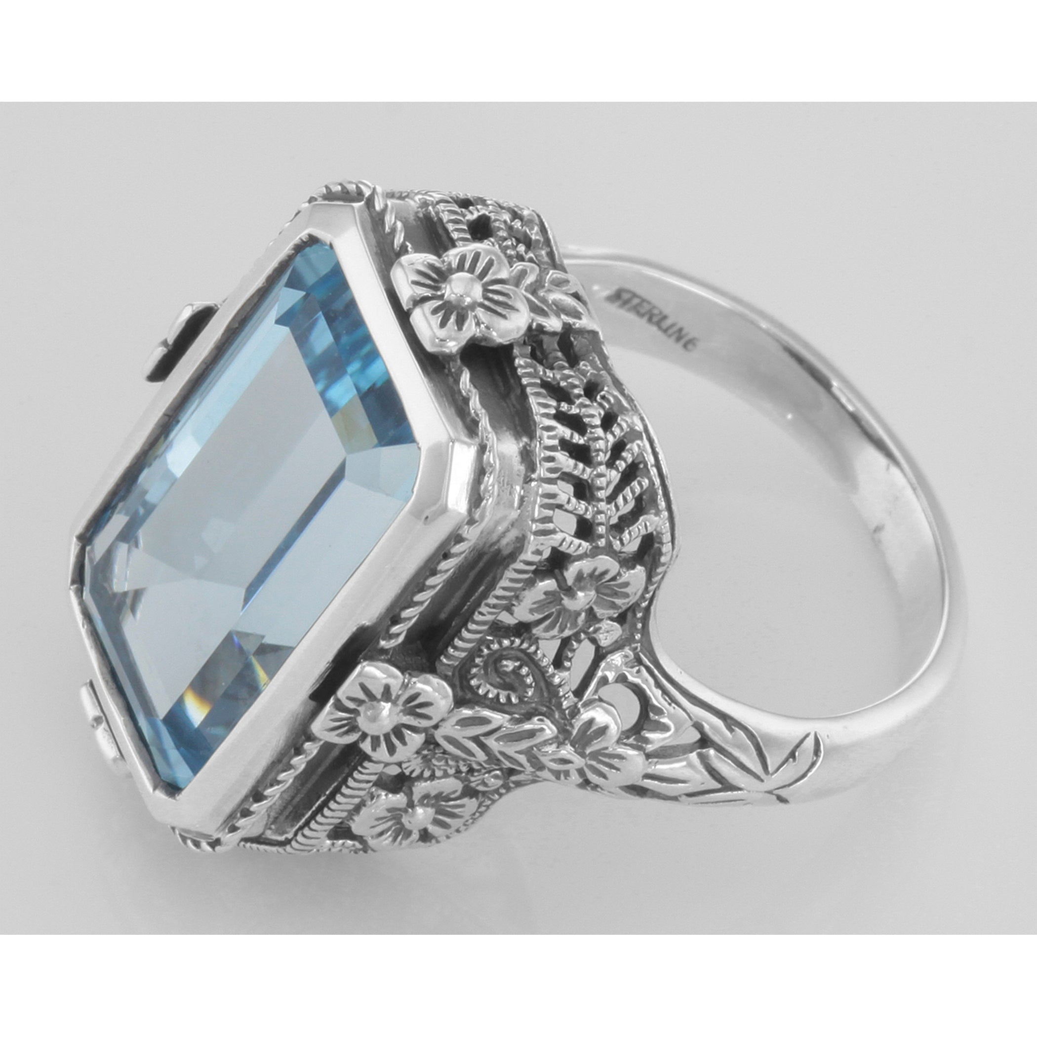 Back view of Victorian Style 5.5 Carat Blue Topaz Filigree Ring showing 925 sterling silver hallmark