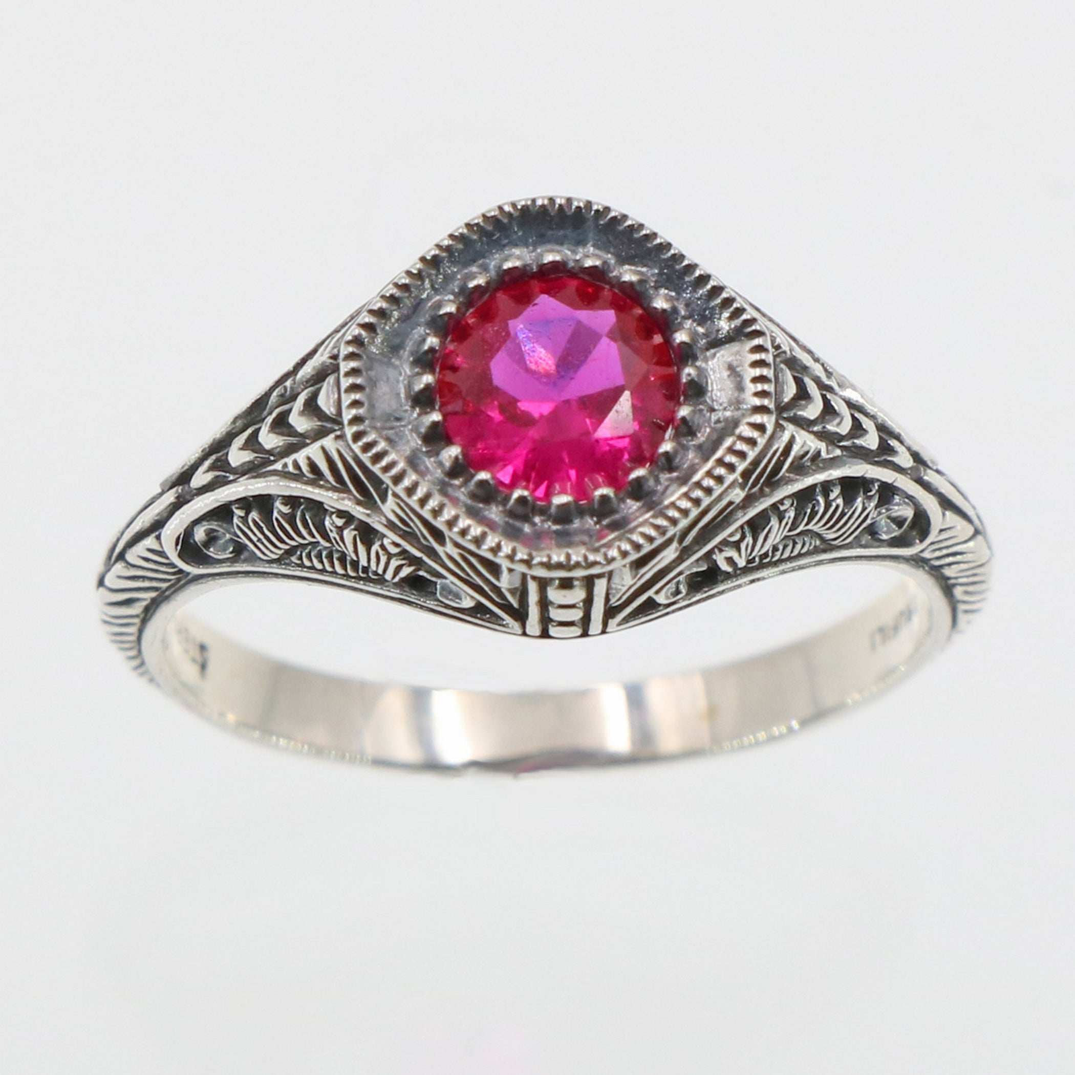 Back view of Art Deco Style Sterling Silver Red Pink Ruby Filigree Ring showing 925 sterling silver hallmark and pin back