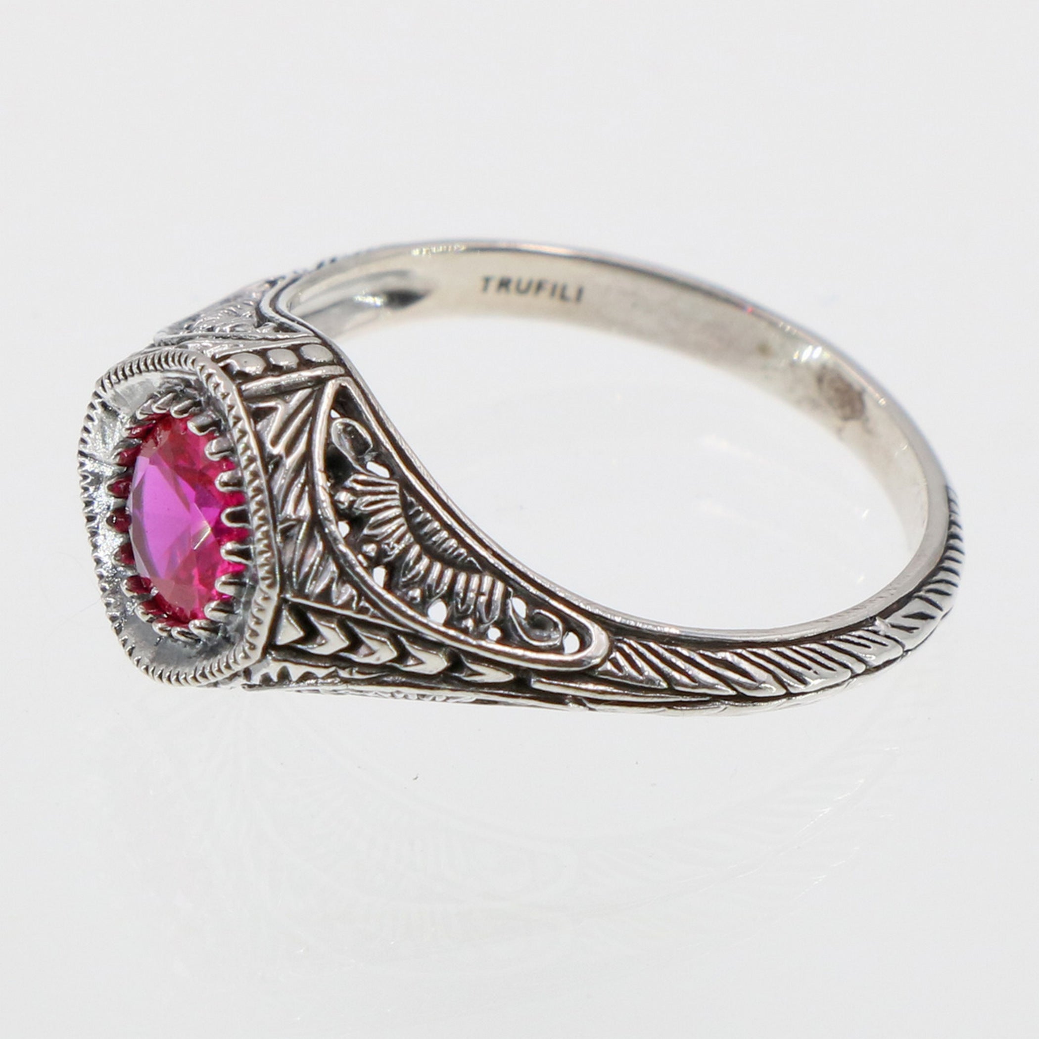 Detail view of Art Deco Style Sterling Silver Red Pink Ruby Filigree Ring highlighting Ruby