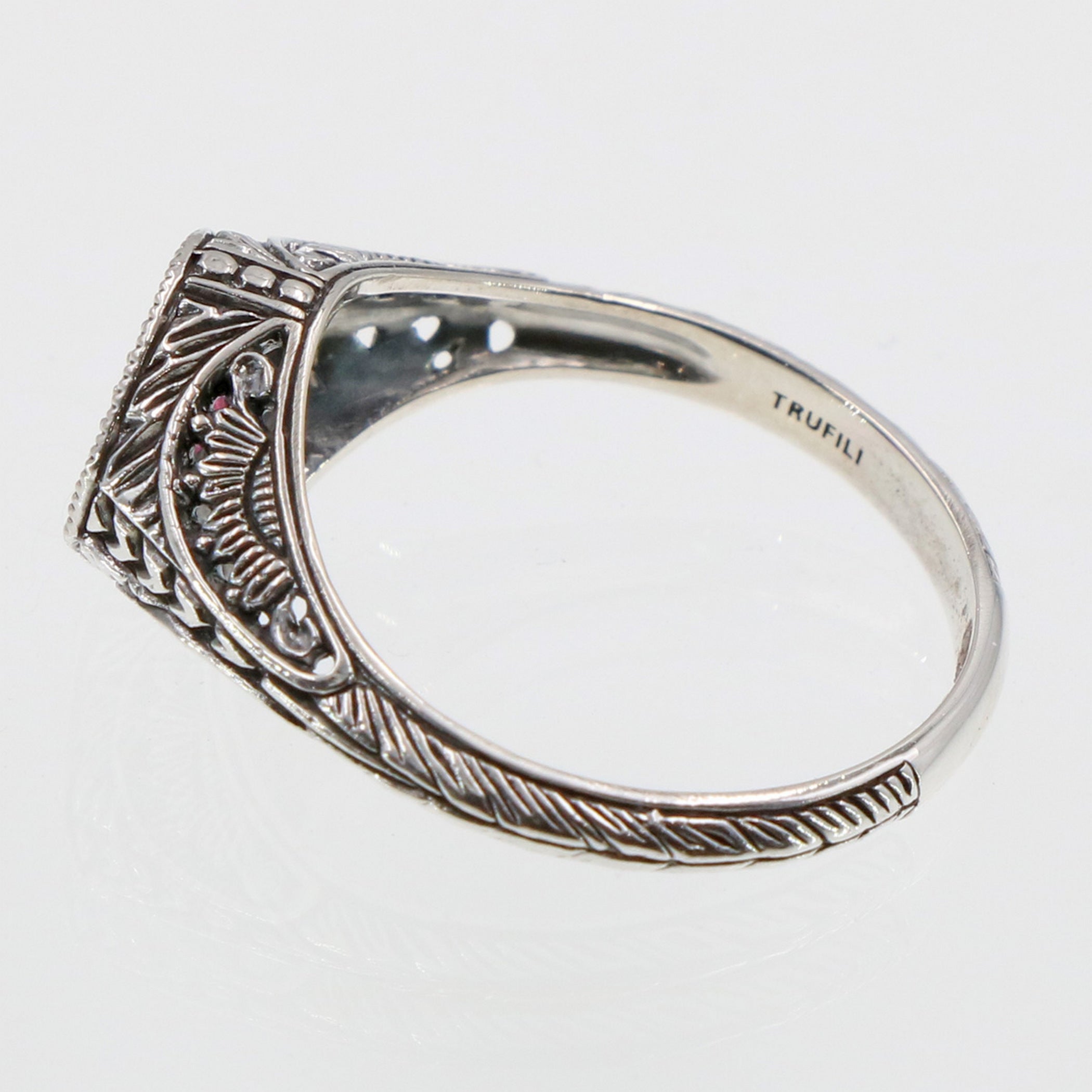 Detail view of Art Deco Style Sterling Silver Red Pink Ruby Filigree Ring highlighting Ruby