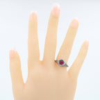 Detail view of Art Deco Style Sterling Silver Red Pink Ruby Filigree Ring highlighting Ruby