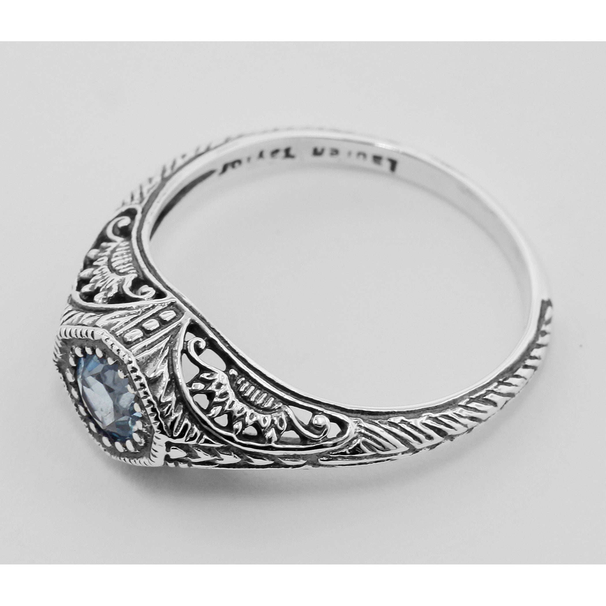 Detail view of Art Deco Style Blue Topaz Filigree Ring highlighting Blue Topaz