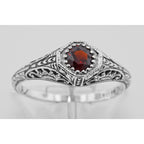 Detail view of Antique Style Garnet Filigree Ring highlighting Garnet