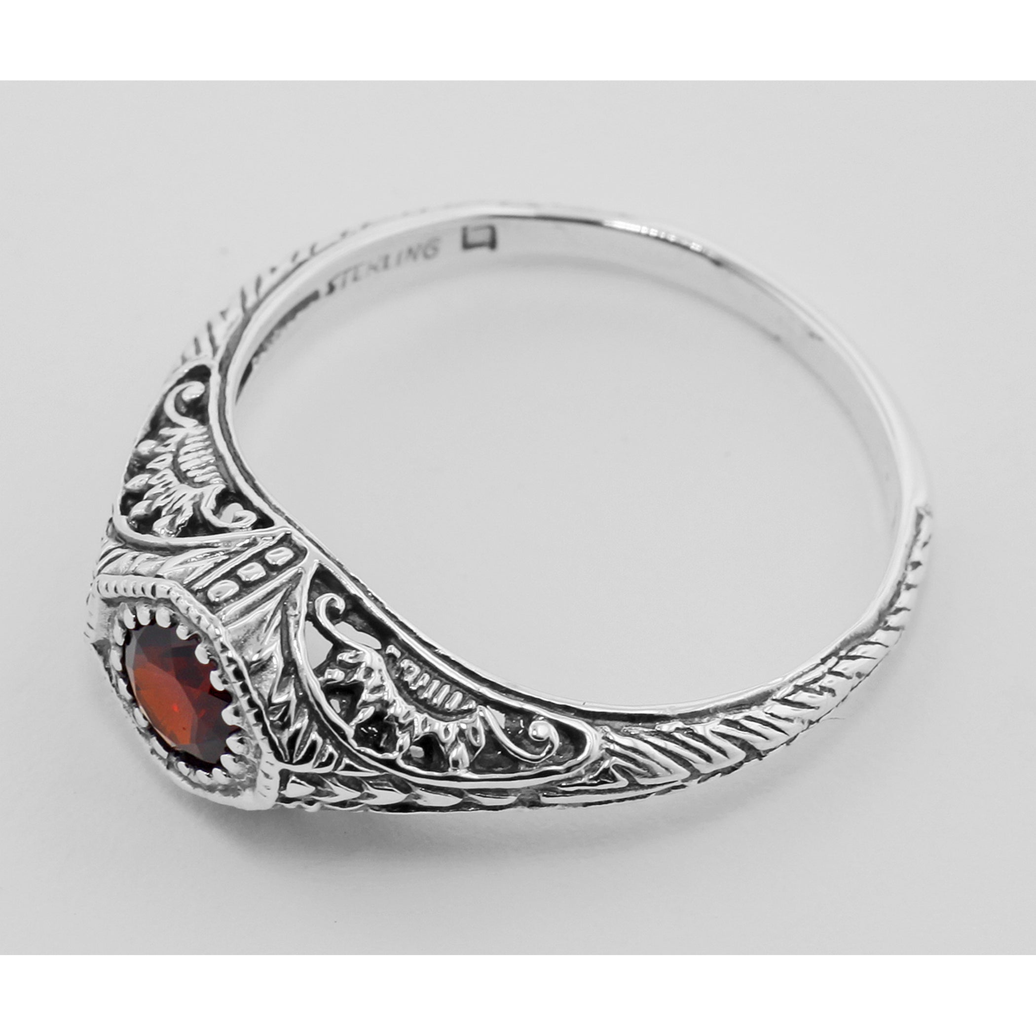 Back view of Antique Style Garnet Filigree Ring showing 925 sterling silver hallmark