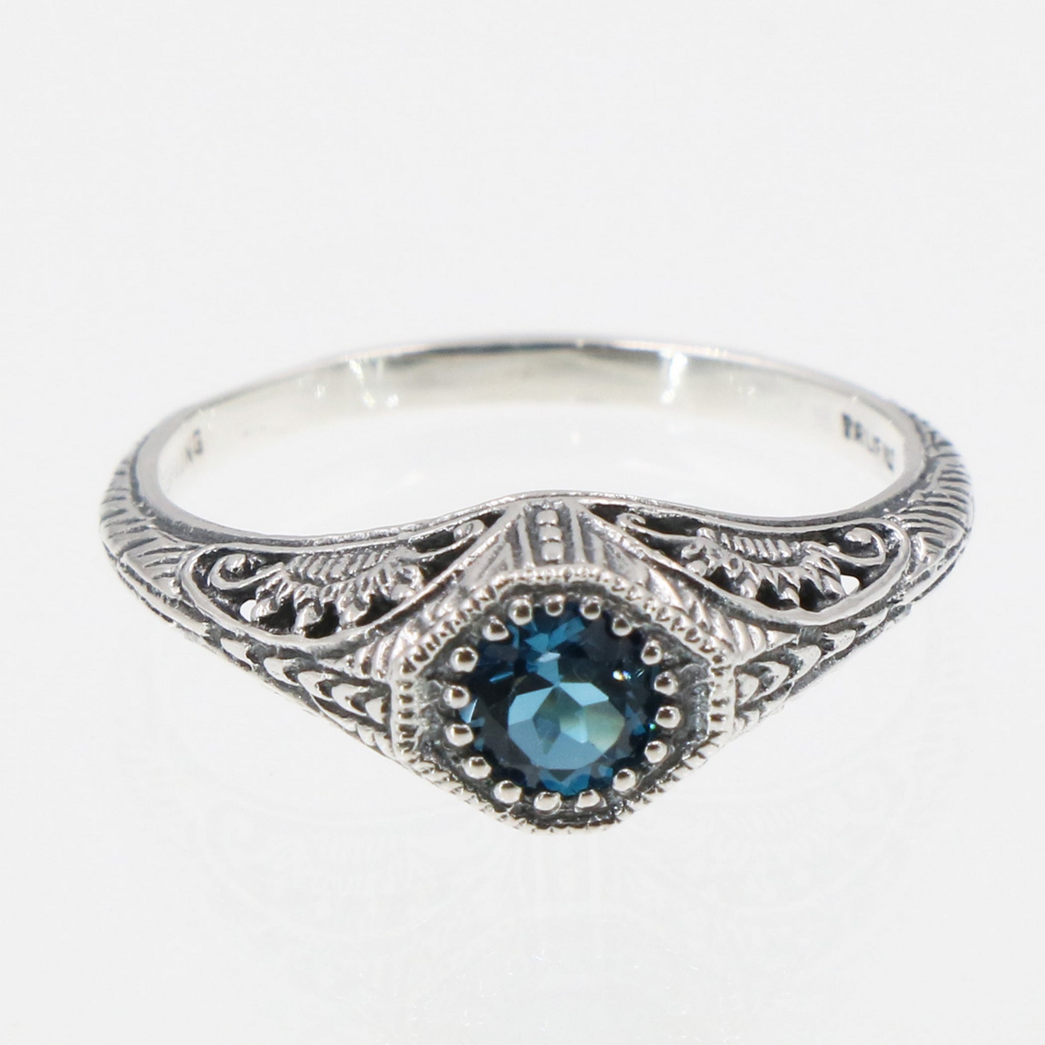 Back view of Art Deco Style London Blue Topaz Solitaire Filigree Ring showing 925 sterling silver hallmark