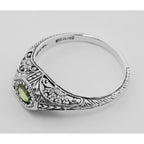 Detail view of Art Deco Style Peridot Solitaire Filigree Ring highlighting Peridot