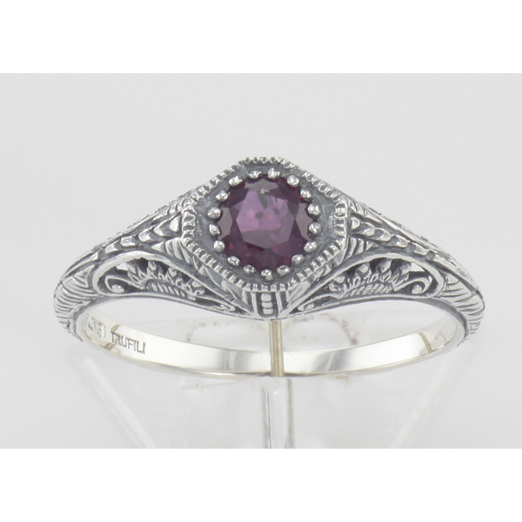 Detail view of Victorian Style Ruby Filigree Ring Sterling Silver highlighting Ruby