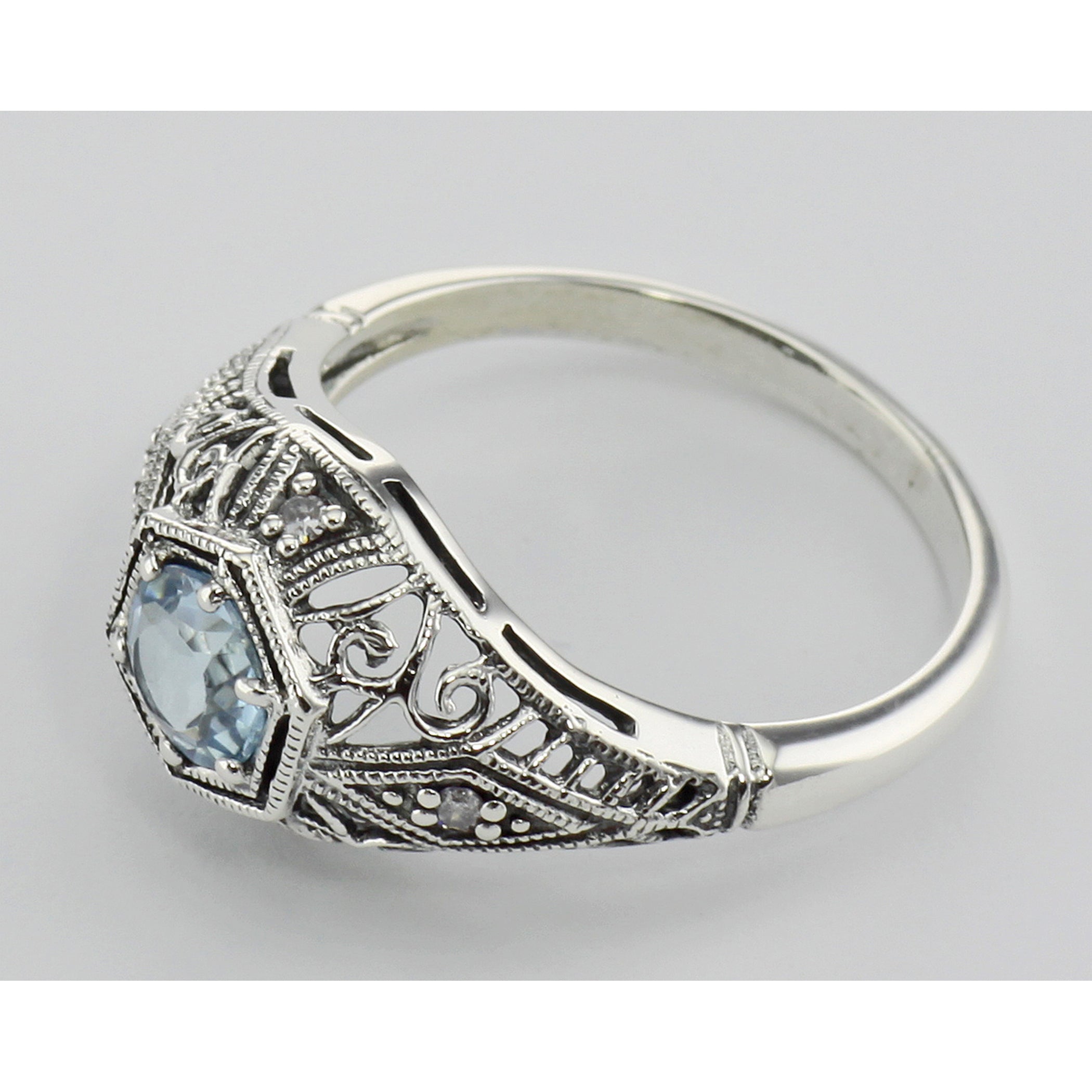 Detail view of Blue Topaz Victorian Style Filigree Ring w/ 4 Diamonds highlighting Blue Topaz, Diamond