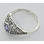 Detail view of Tanzanite Filigree Ring Art Deco Style w/ 4 Diamonds highlighting Diamond