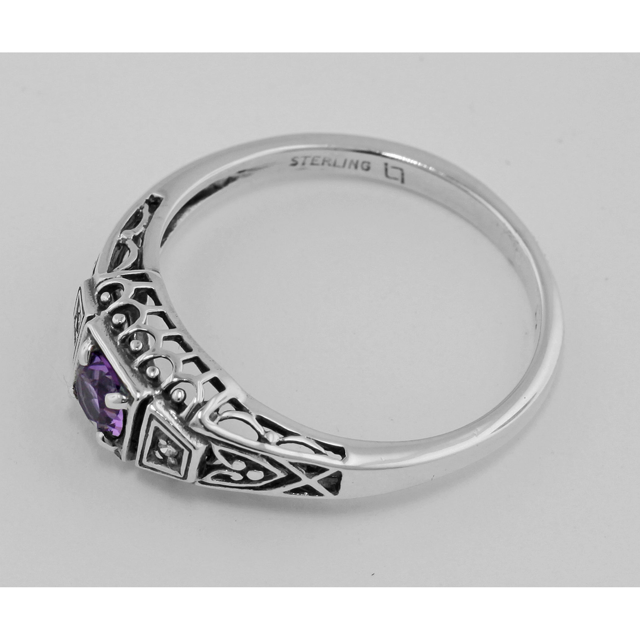 Detail view of Amethyst Filigree Ring w/ 2 Diamonds highlighting Amethyst, Diamond