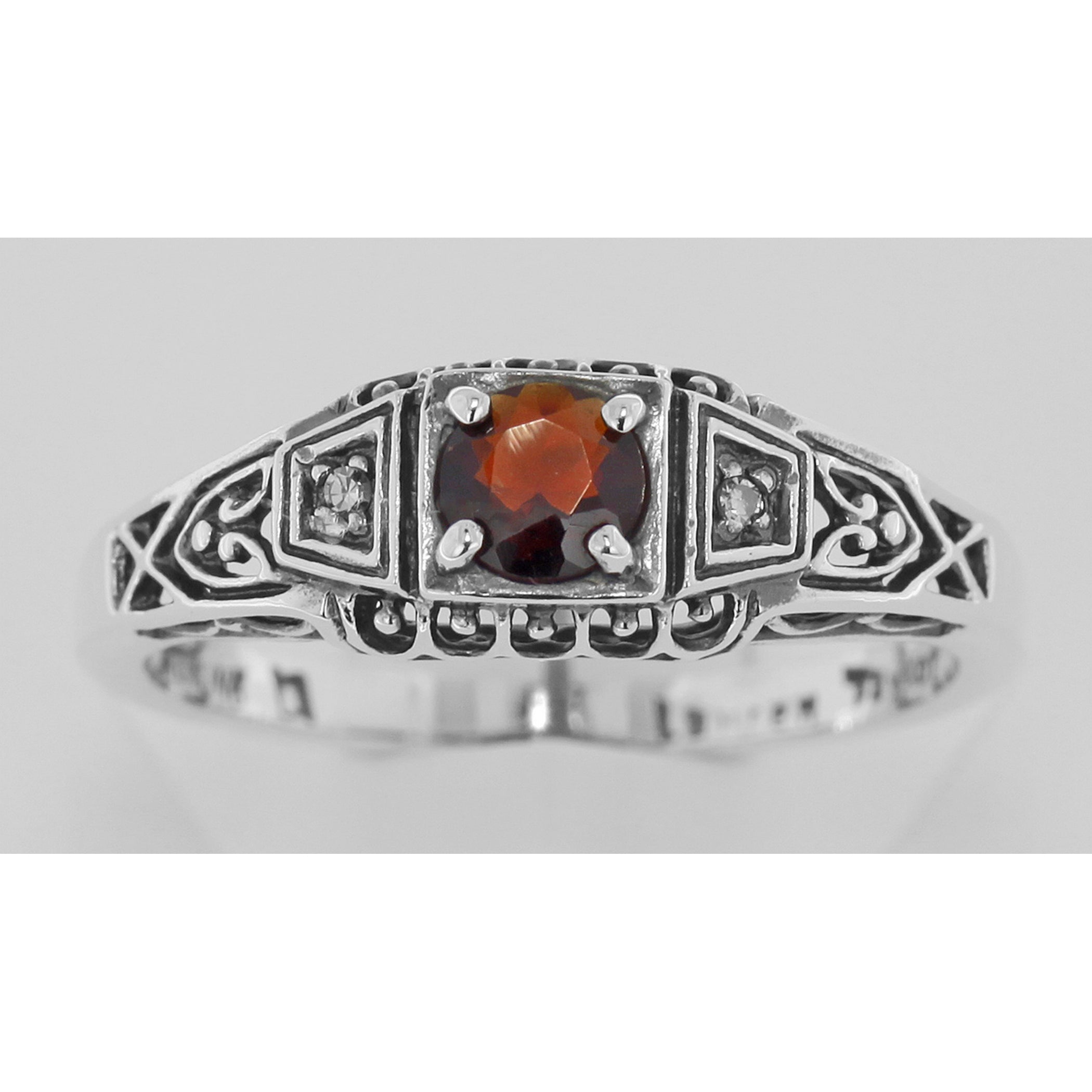 Detail view of Garnet Filigree Ring w/ 2 Diamonds highlighting Garnet, Diamond