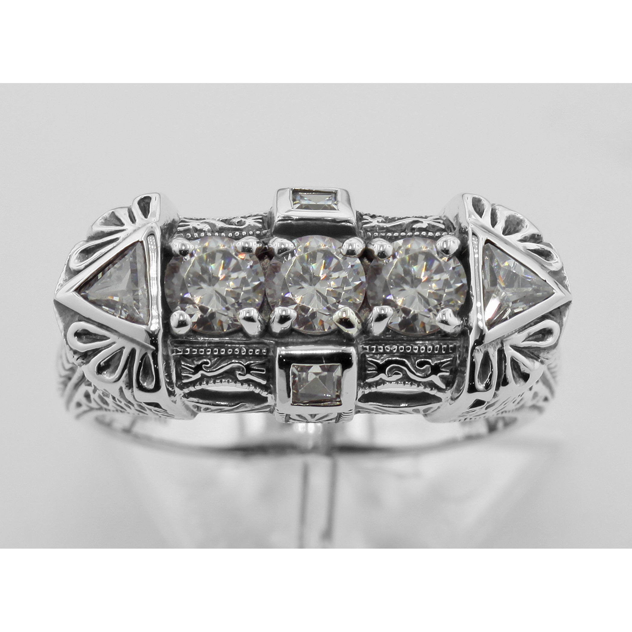 Detail view of Art Deco Style Sterling Silver Filigree Ring w/ CZ highlighting CZ