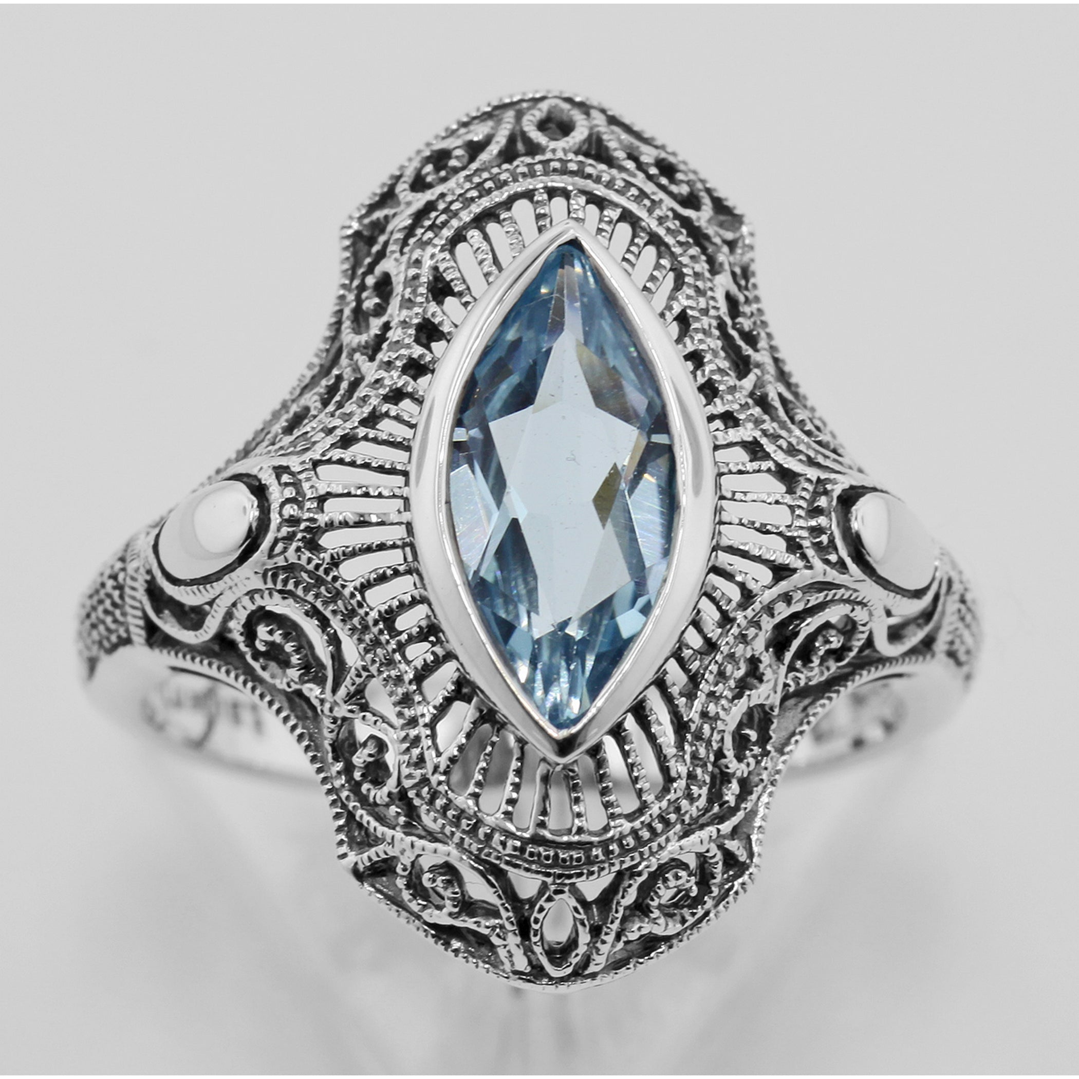 Back view of Victorian Style 1.5 Carat Blue Topaz Filigree Ring showing 925 sterling silver hallmark