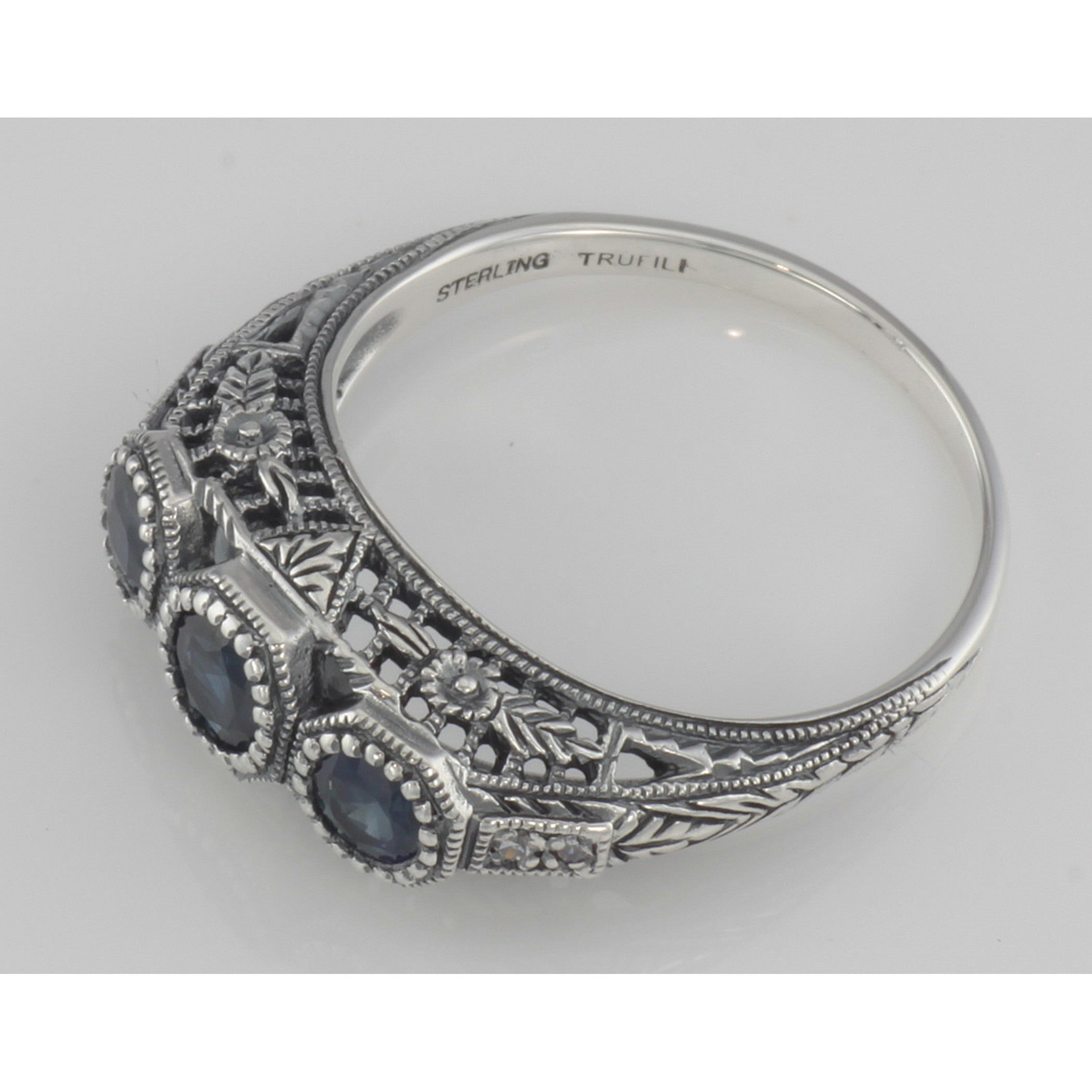 Back view of Art Deco Style Blue Sapphire Filigree Ring w/ 4 Diamonds showing 925 sterling silver hallmark