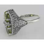 Detail view of Art Deco Style 2 Stone Peridot and Diamond Filigree Ring Sterling Silver highlighting Diamond, Peridot
