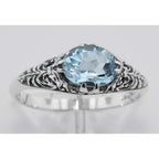Detail view of Natural Oval Blue Topaz Gemstone Filigree Ring highlighting Blue Topaz