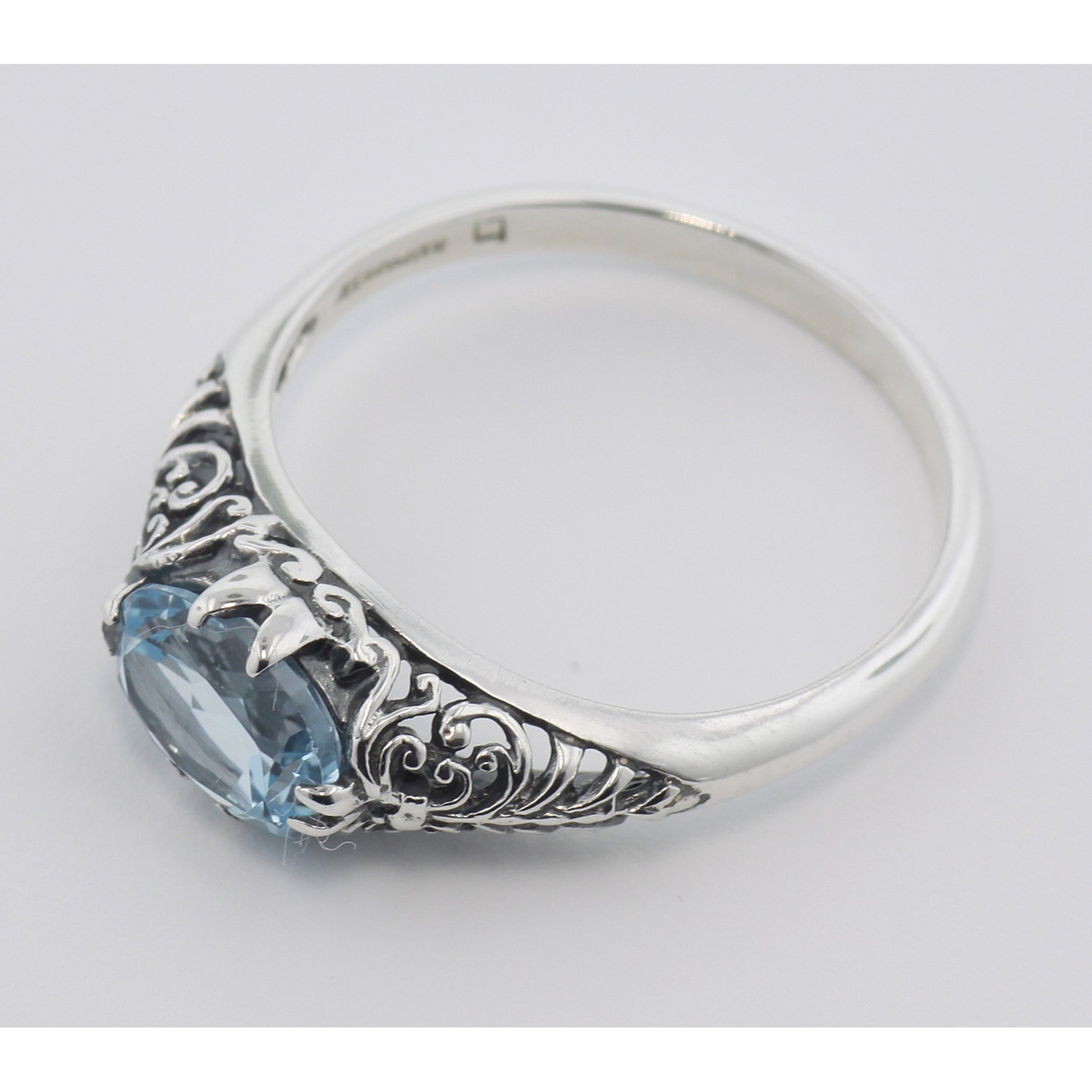 Back view of Natural Oval Blue Topaz Gemstone Filigree Ring showing 925 sterling silver hallmark