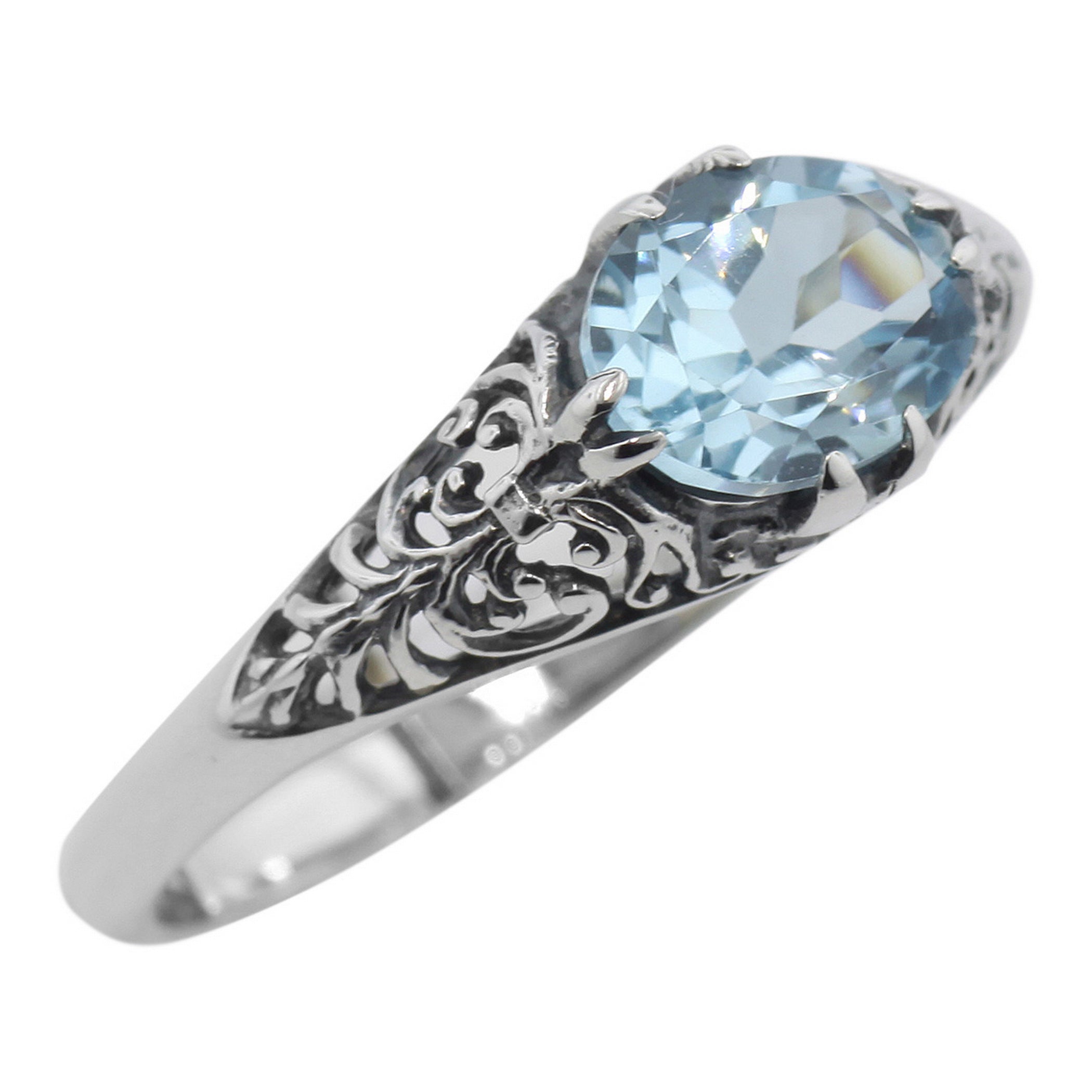 Filigree, Blue Topaz, sterling silver rings, front view
