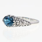 Detail view of Oval London Blue Topaz Gemstone Filigree Ring highlighting Blue Topaz, London Blue Topaz