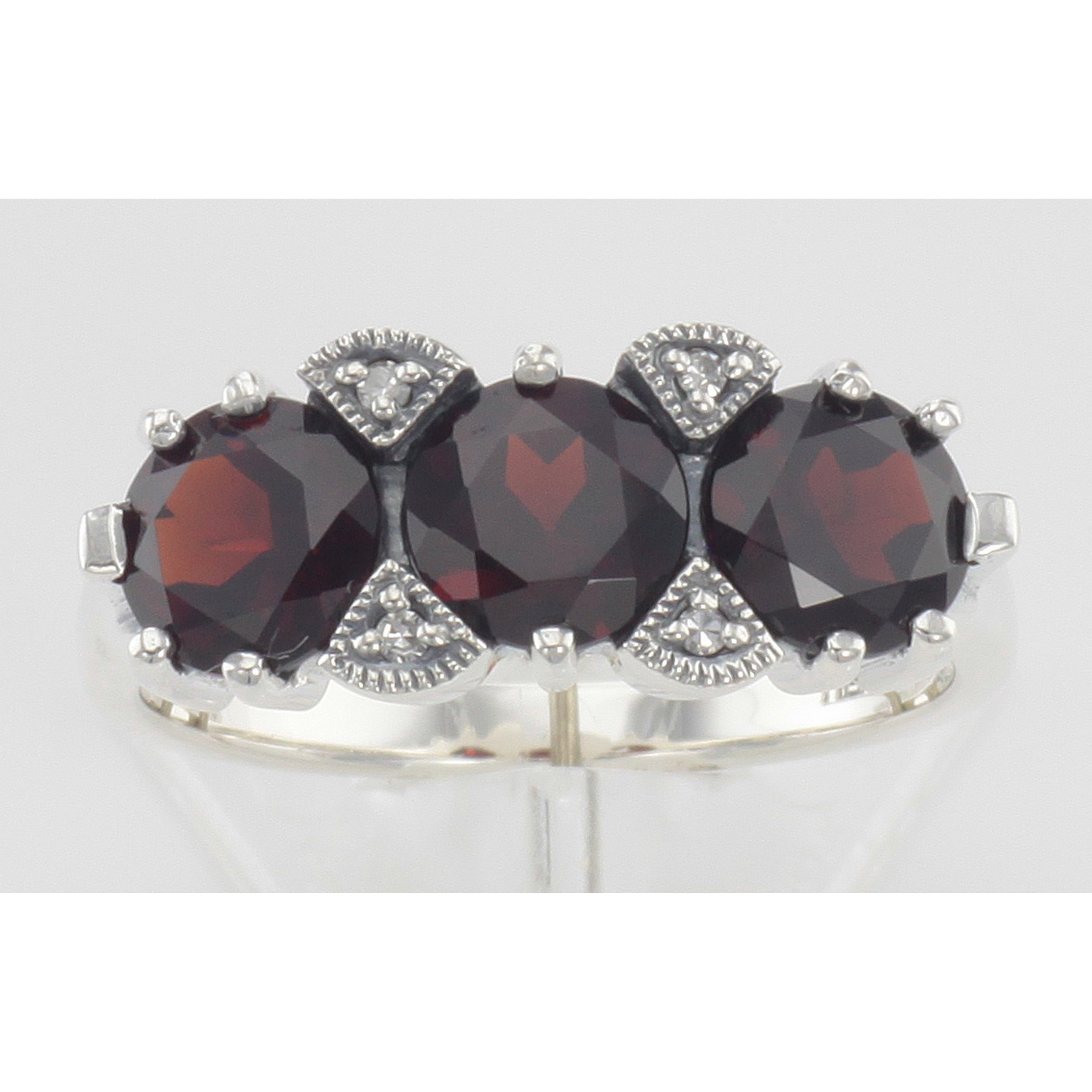 Detail view of Lovely Art Deco Style 3 Stone Red Garnet Diamond Ring highlighting Garnet, Diamond