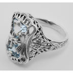Back view of Art Deco Style Blue Topaz Ring with Flower Design showing 925 sterling silver hallmark