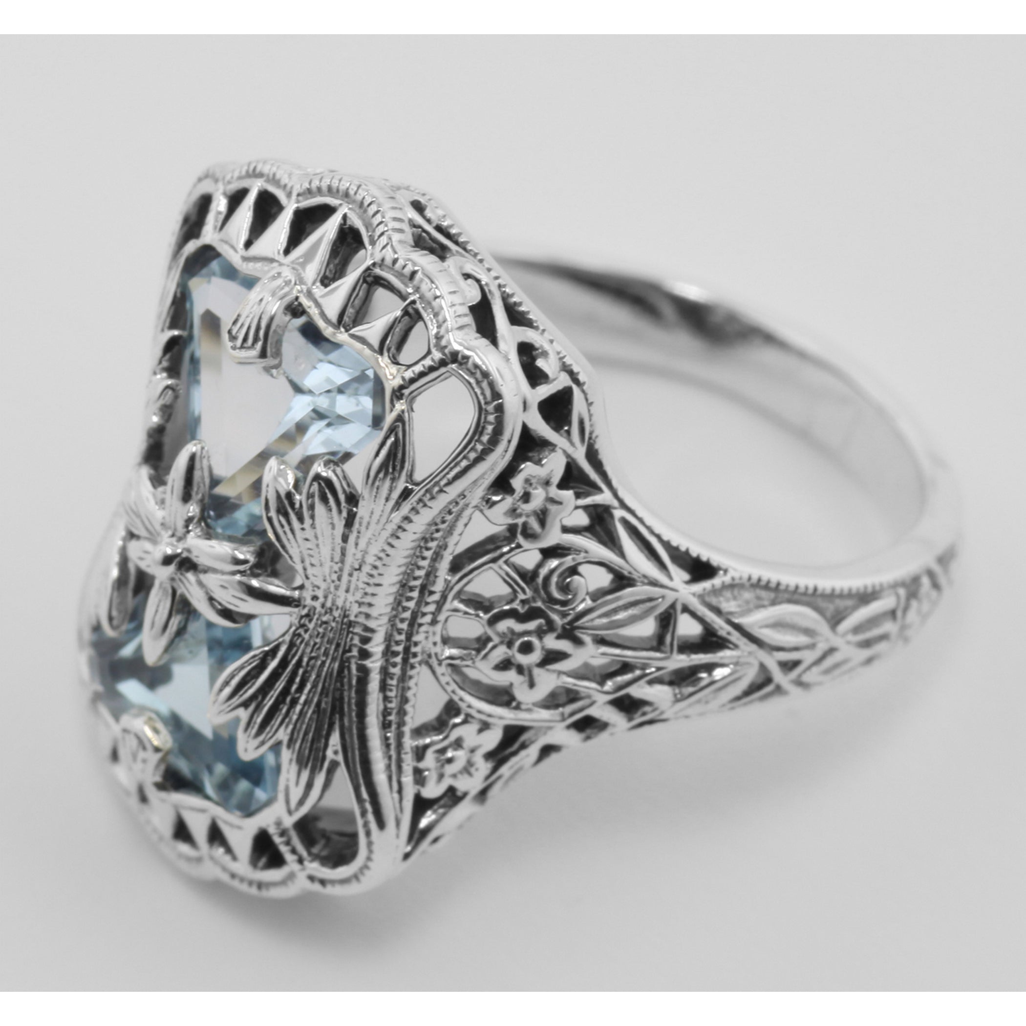 Back view of Art Deco Style Blue Topaz Ring with Flower Design showing 925 sterling silver hallmark