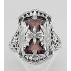 Detail view of Antique Style Garnet Filigree Ring with Flower Design highlighting Garnet