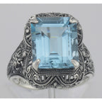 Detail view of Art Deco Style Genuine Emerald Cut Blue Topaz Ring highlighting Blue Topaz, Emerald