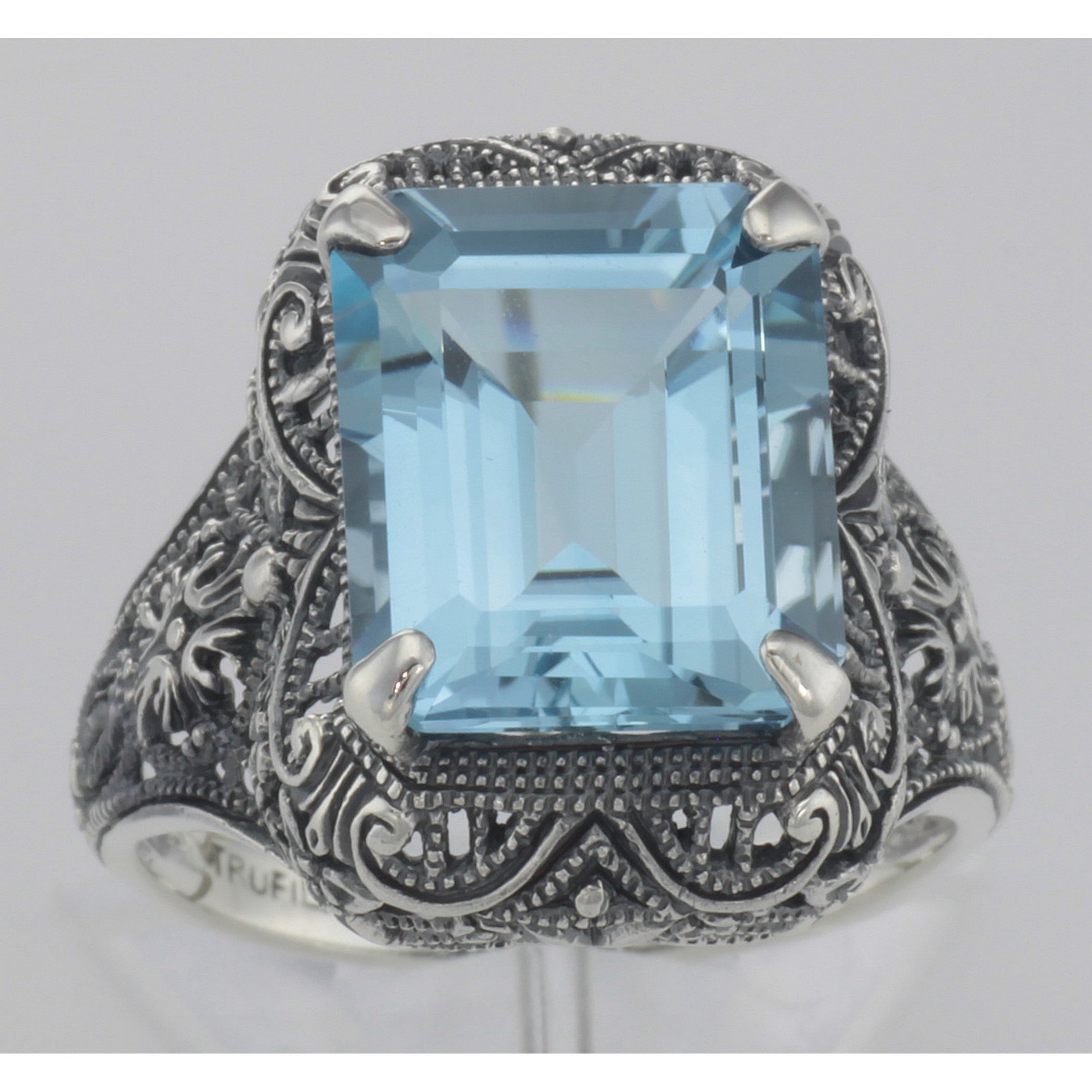 Detail view of Art Deco Style Genuine Emerald Cut Blue Topaz Ring highlighting Blue Topaz, Emerald
