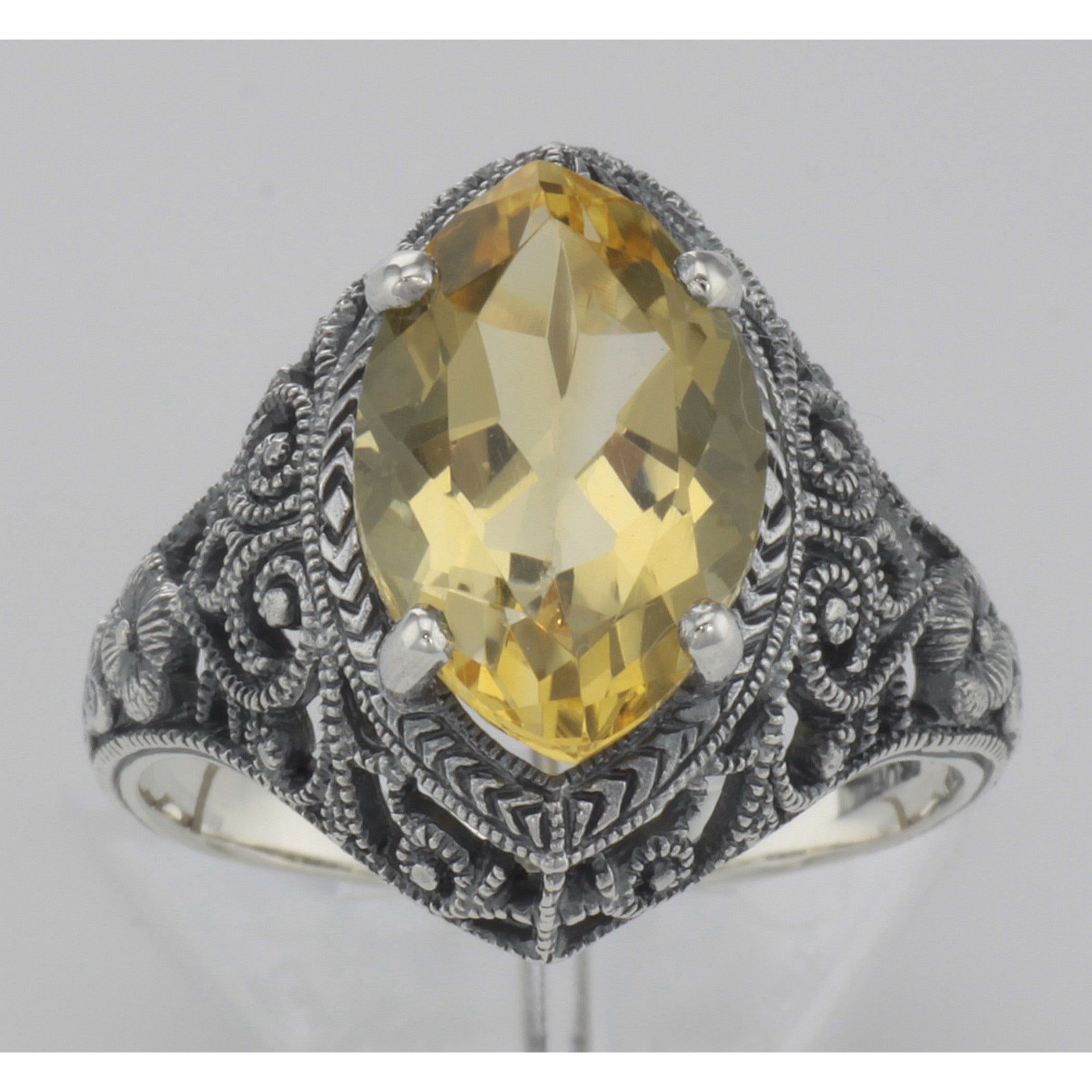 Detail view of 3 Carat Victorian Style Genuine Citrine Filigree Ring Sterling Silver highlighting Citrine