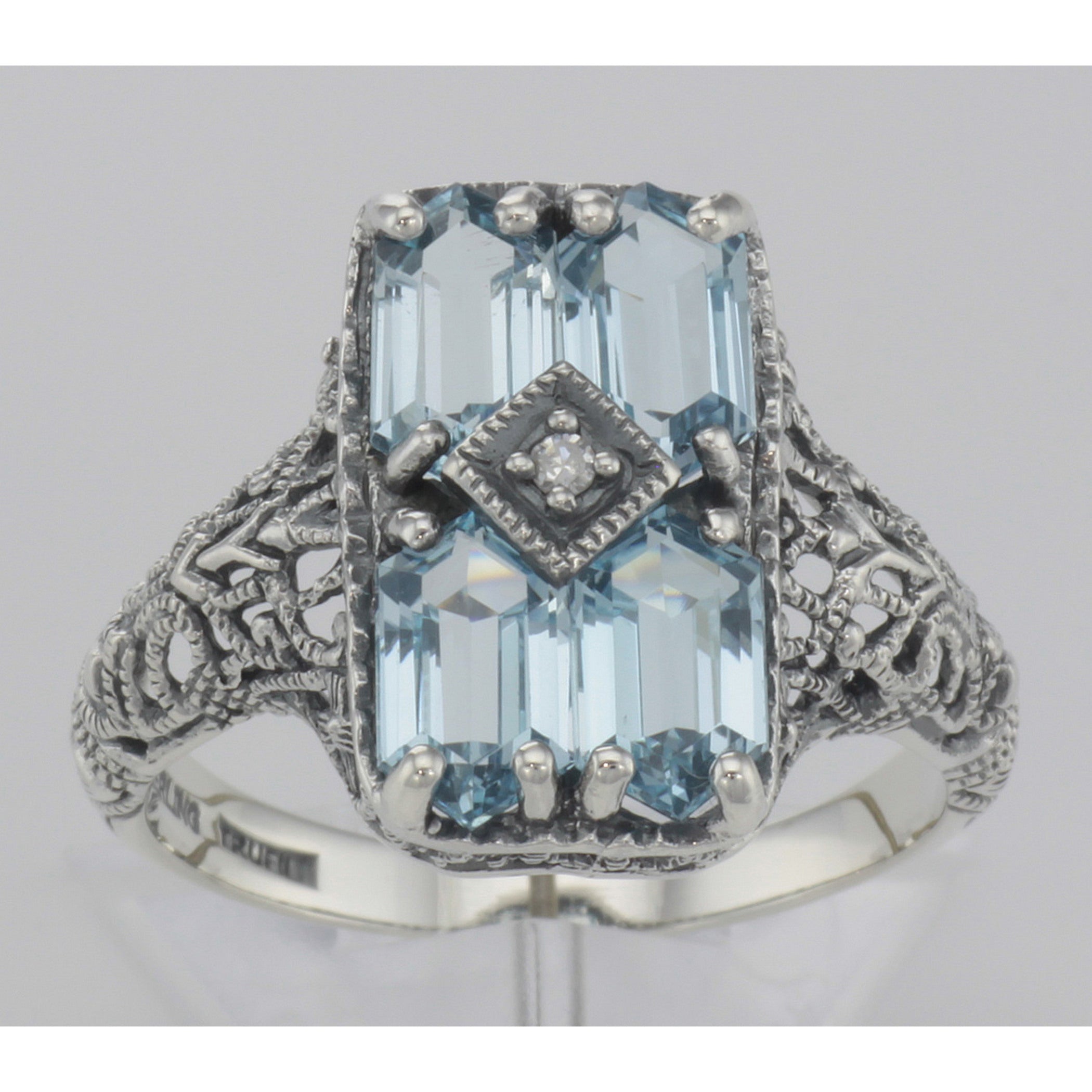 Detail view of Art Deco Style 2 Carat Blue Topaz Filigree Ring w/ Diamond Sterling Silver highlighting Blue Topaz, Diamond