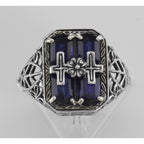 Detail view of Cross and Flower Design Blue Sapphire Filigree Ring highlighting Sapphire
