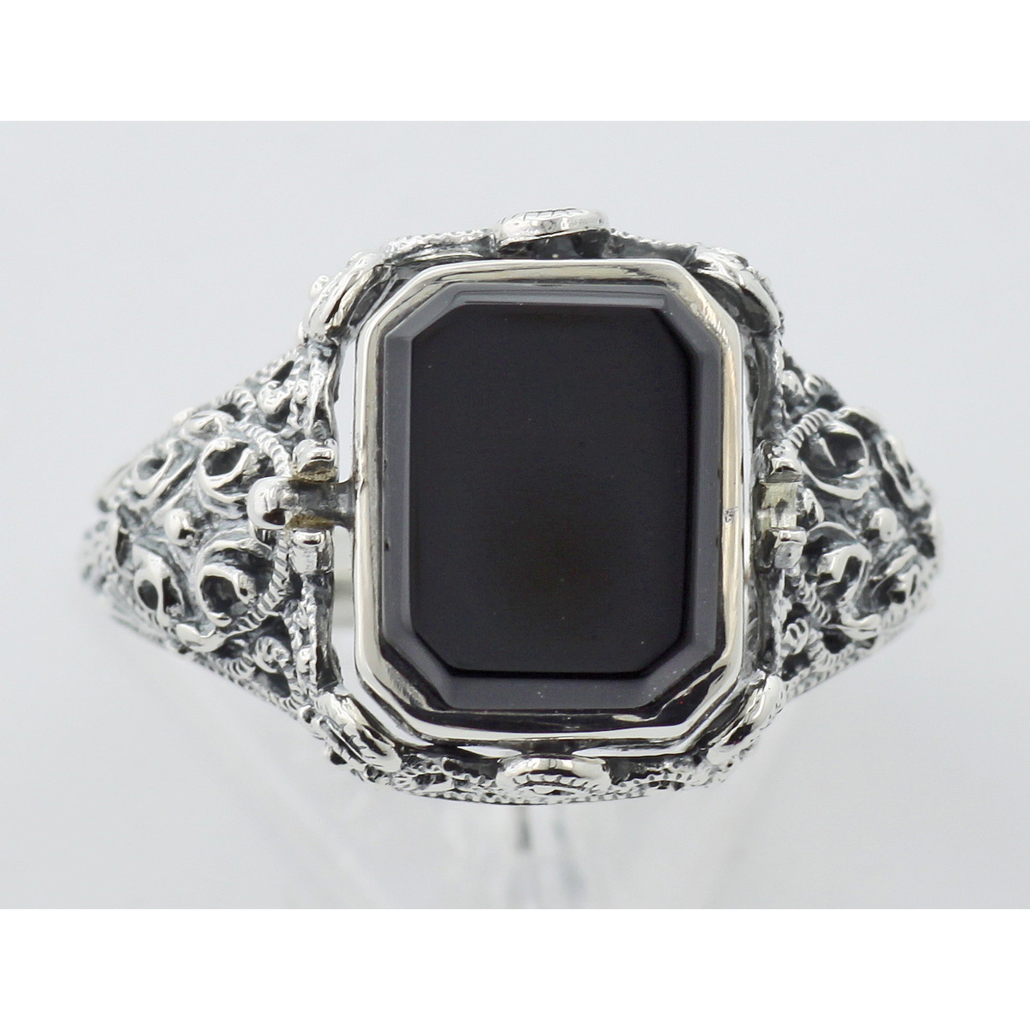 Detail view of Hand Carved Italian Cameo / Onyx Filigree Flip Ring highlighting Onyx