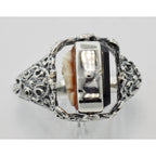 Detail view of Hand Carved Italian Cameo / Onyx Filigree Flip Ring highlighting Onyx