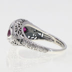 Detail view of Art Deco Style White Topaz Filigree Ring Red Ruby Accents Sterling Silver highlighting White Topaz, Ruby