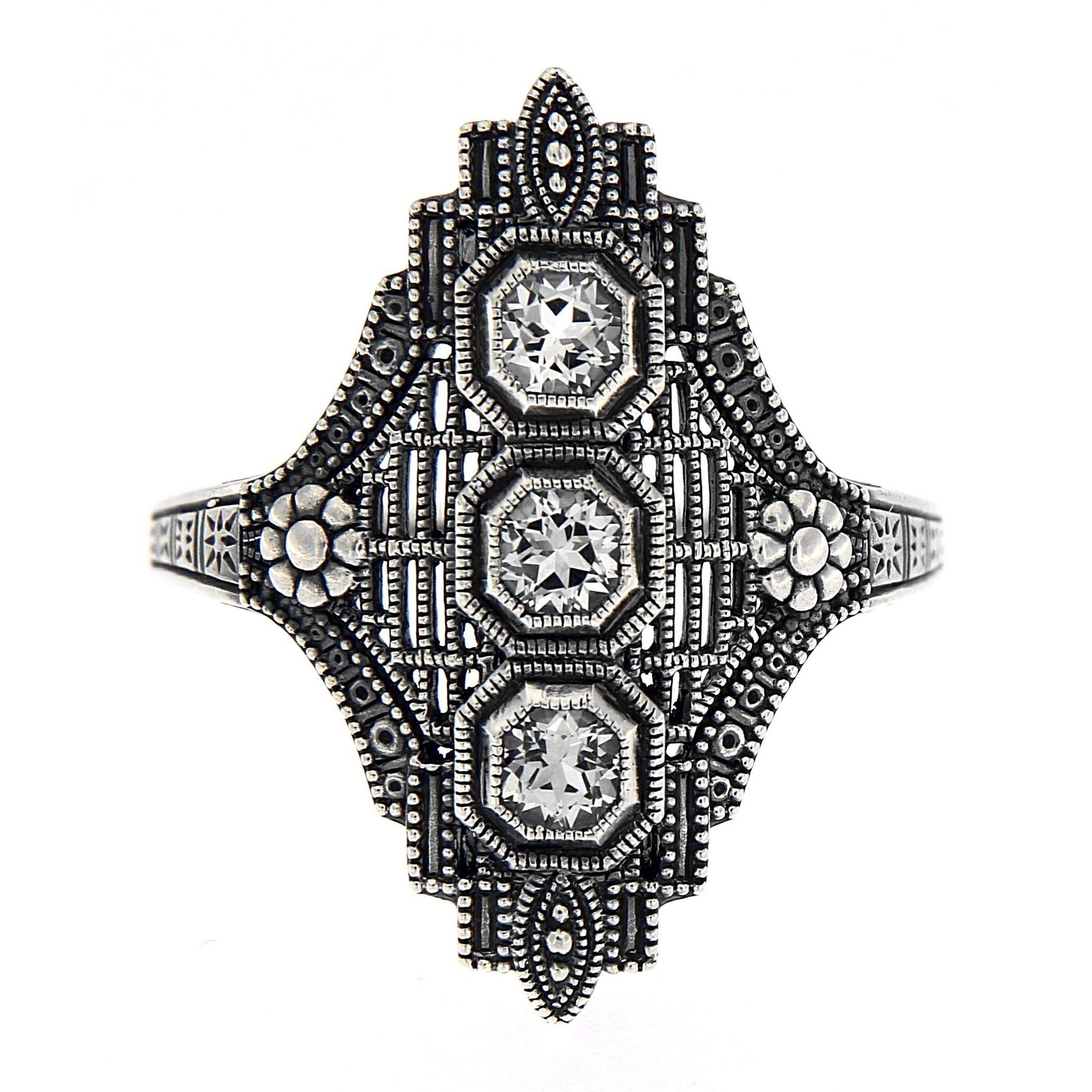 Detail view of Art Deco Style Three Stone Sterling Silver Filigree White Topaz Ring highlighting White Topaz