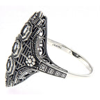 Back view of Art Deco Style Three Stone Sterling Silver Filigree White Topaz Ring showing 925 sterling silver hallmark