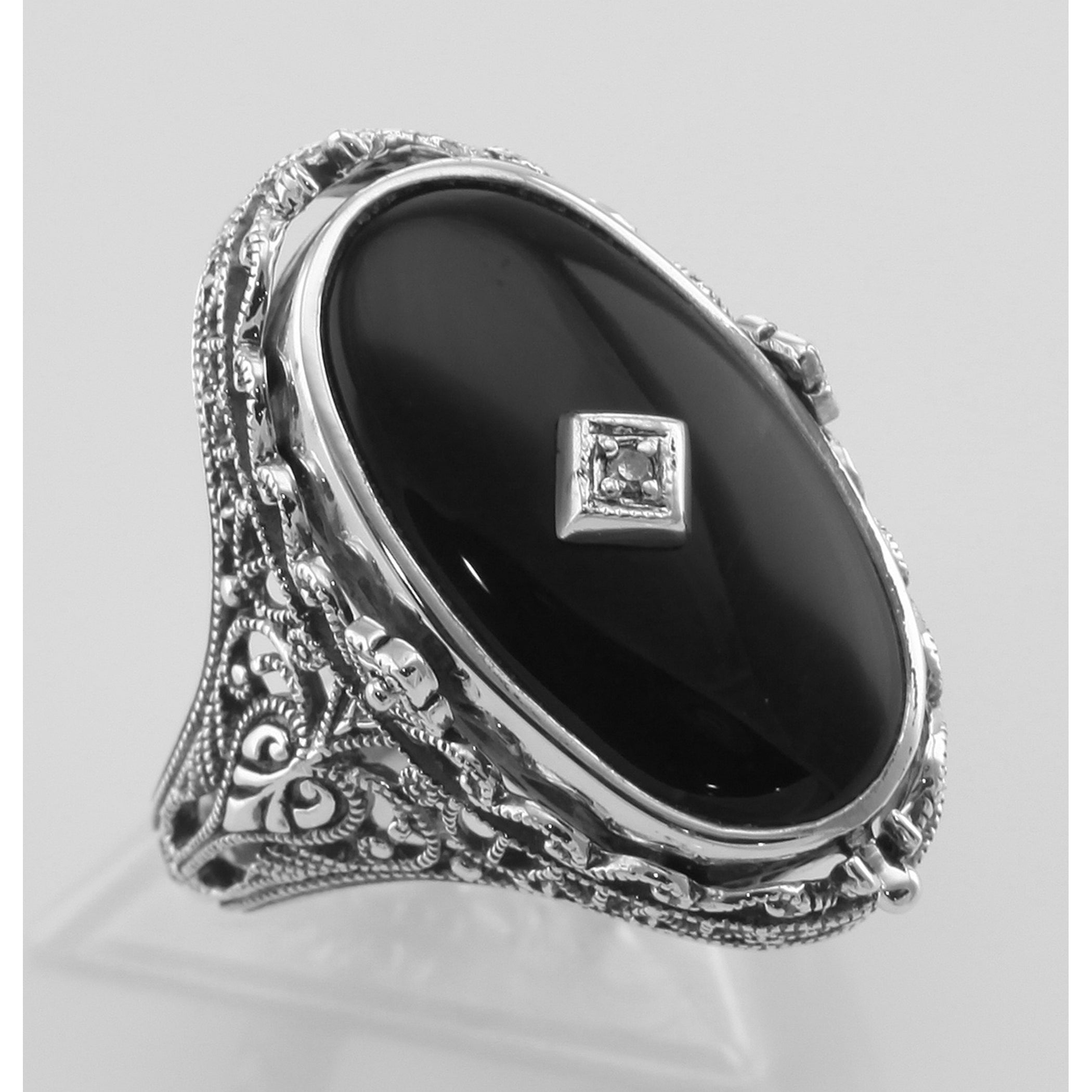 Detail view of Antique Style Cameo / Onyx Filigree Flip Ring w / Diamond highlighting Diamond, Onyx