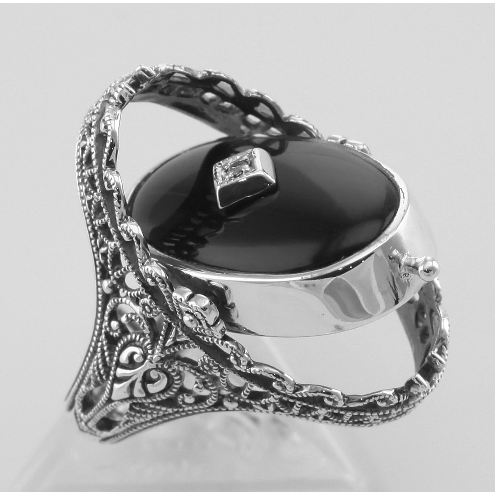 Detail view of Antique Style Cameo / Onyx Filigree Flip Ring w / Diamond highlighting Diamond, Onyx