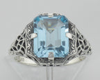 Detail view of Antique Style 2 1/2 Carat Blue Topaz Filigree Ring highlighting Blue Topaz