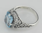 Back view of Antique Style 2 1/2 Carat Blue Topaz Filigree Ring showing 925 sterling silver hallmark