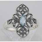 Detail view of Victorian Style Blue Topaz Filigree Ring with Two Diamonds Sterling Silver highlighting Blue Topaz, Diamond